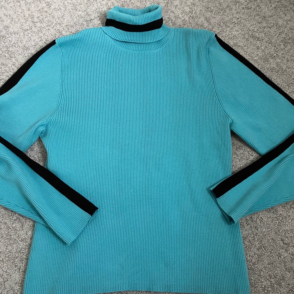 Light turquoise turtleneck with black trim